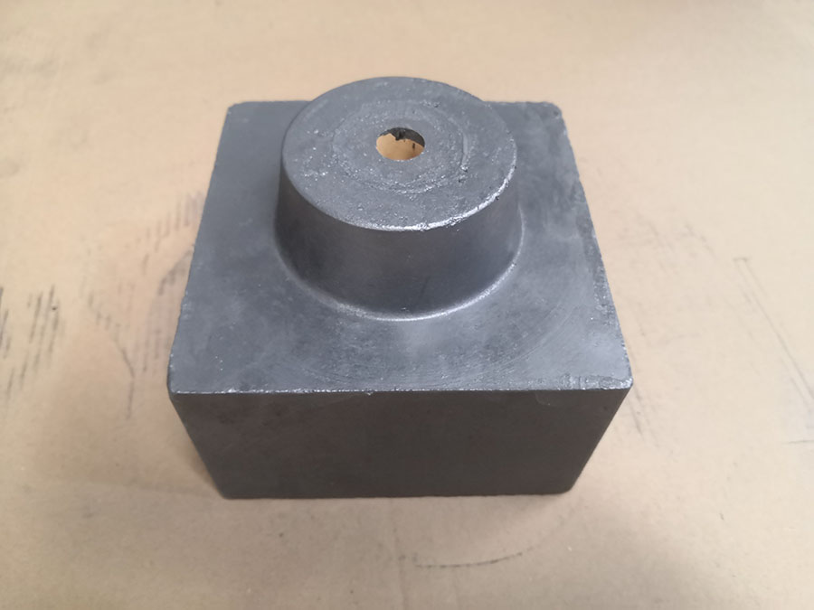 Tundish metering nozzle with zirconium insert